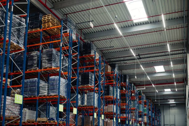 Warehouse or storage and shelves with cardboard boxes. Industrial background